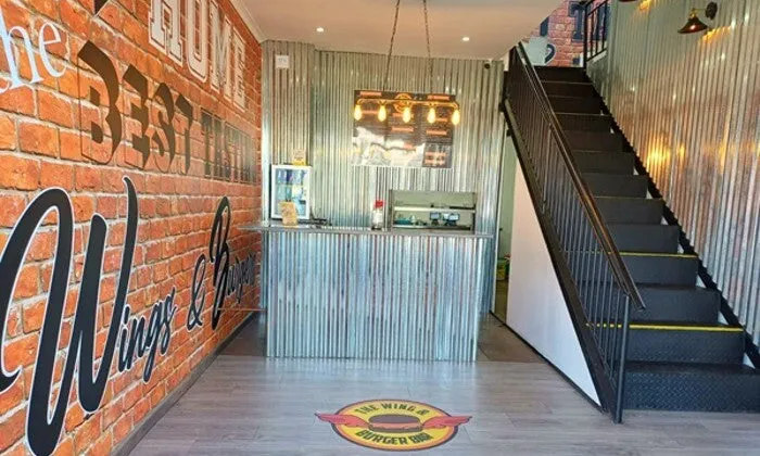 Choice of Any Burger with Side for 2, 4, or 6 at The Wing and Burger Bar