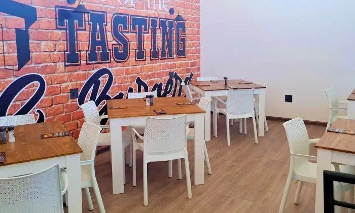 Choice of Any Burger with Side for 2, 4, or 6 at The Wing and Burger Bar