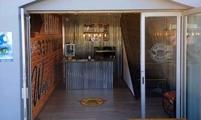 Choice of Any Burger with Side for 2, 4, or 6 at The Wing and Burger Bar