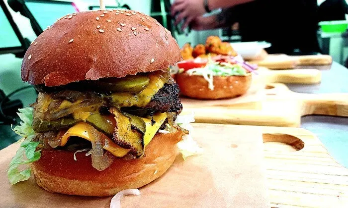 Choice of Any Burger with Side for 2, 4, or 6 at The Wing and Burger Bar